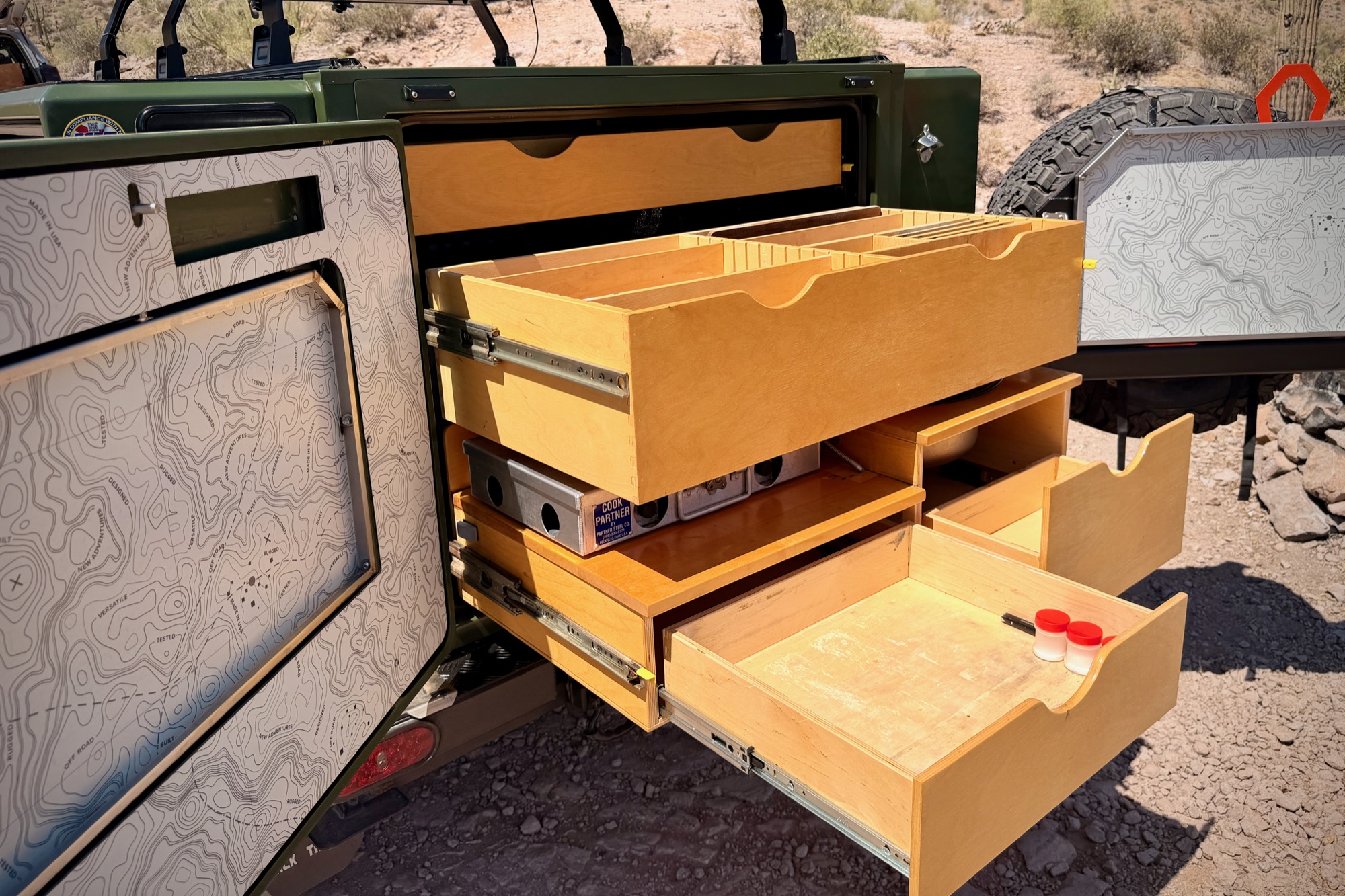 Three-drawer rear storage, fully extended