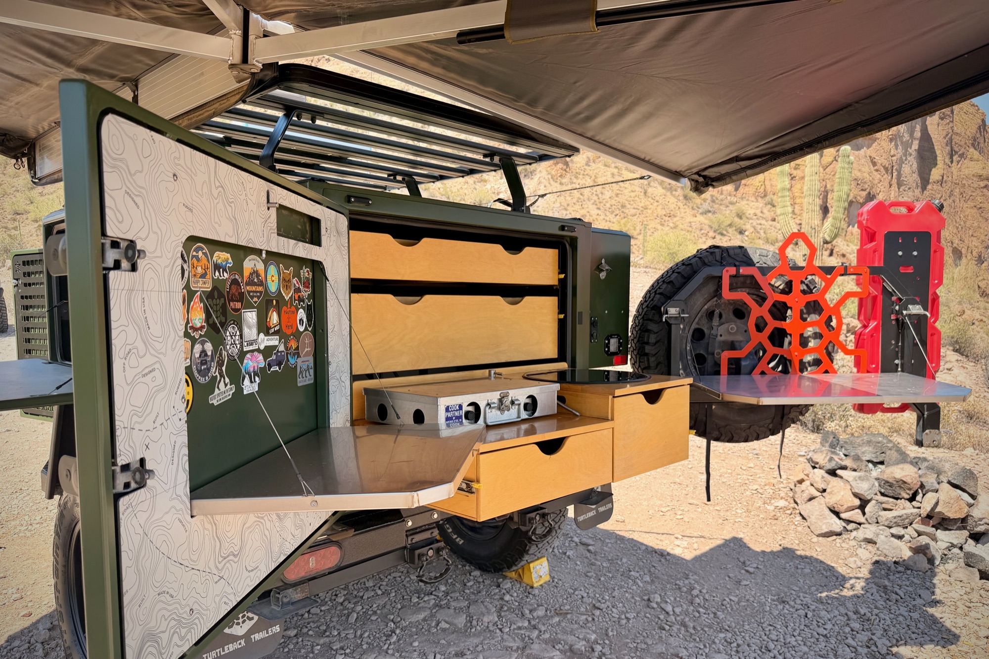 Rear hatch open — interior drawers and storage