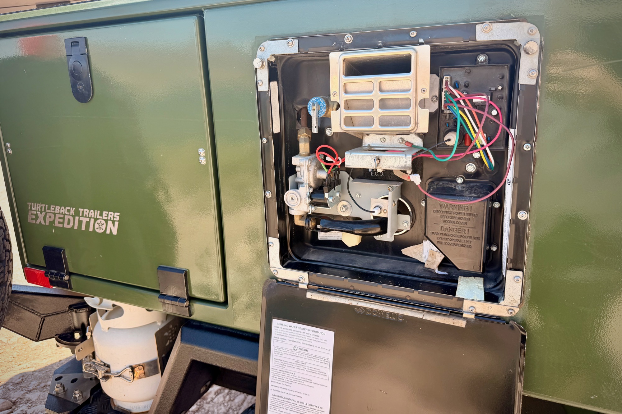 Propane water heater — reinforced, access panel open